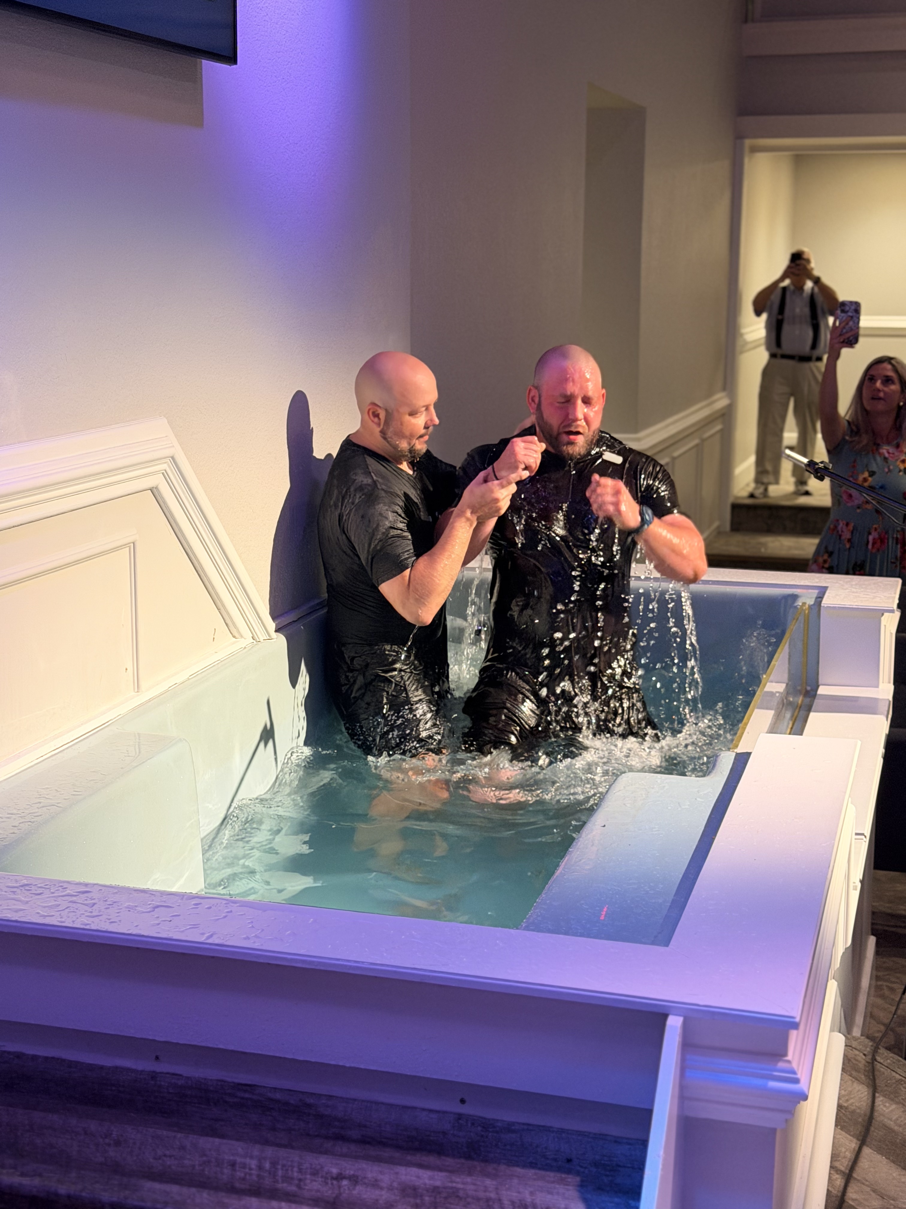 A baptism in the baptistry at Central Church