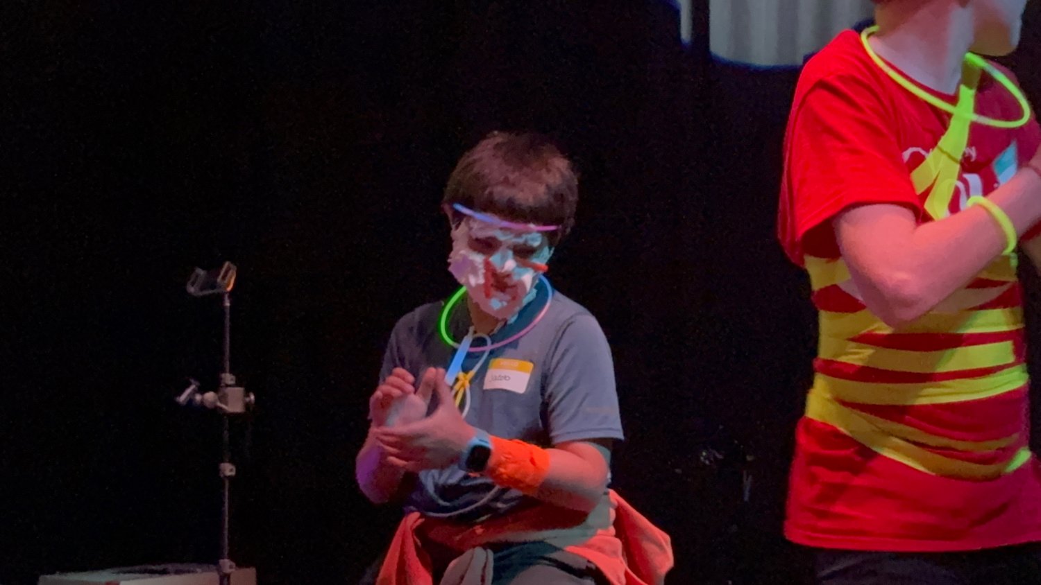 Kids covered in silly string at a Get Messy night