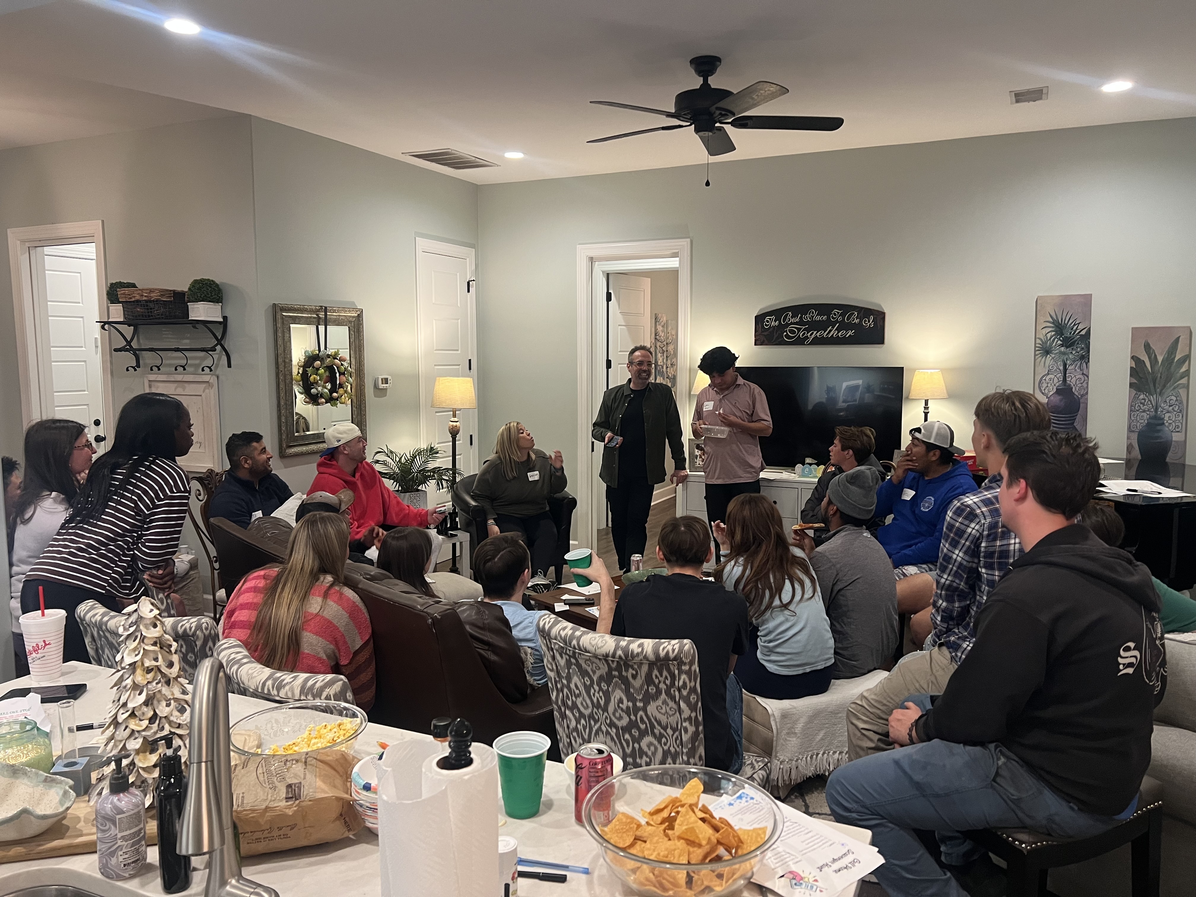 Young adults gathered in a home for group